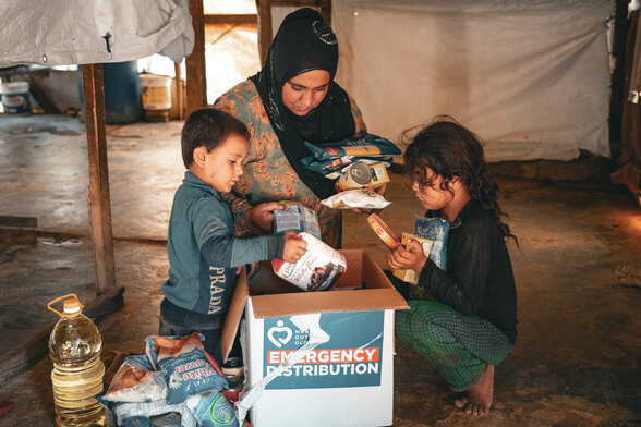 Children carries food bags